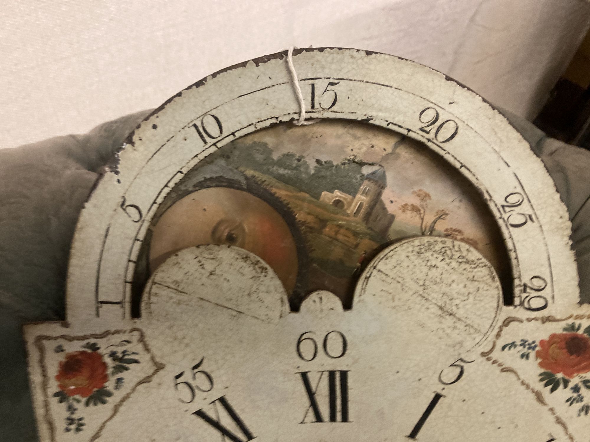 An early 19th century painted longcase clock dial, marked Massey, Newcastle, width 36cm height 50cm